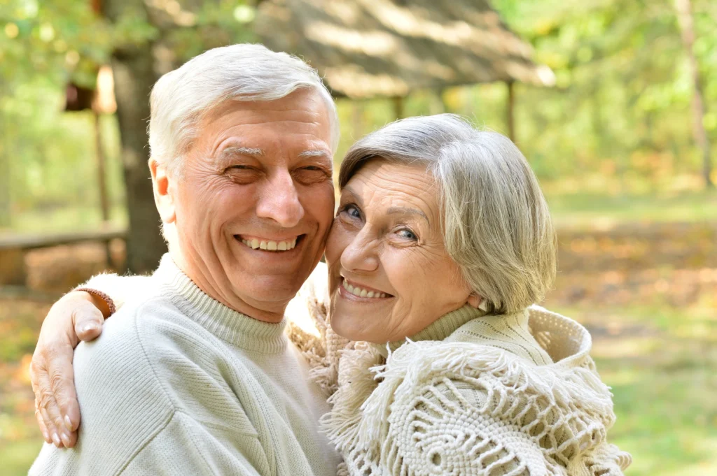 happy-couple-after-getting-dental-implants-in-Cary